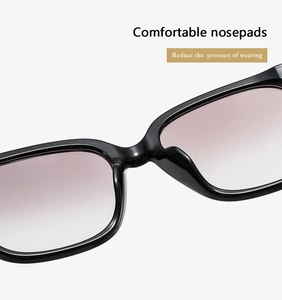 Détail des plaquettes de nez intégrées confortables sur monture noire pour moins de pression