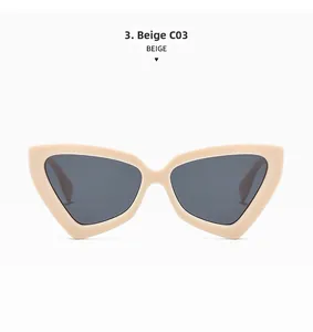 Vue détaillée de lunettes de soleil œil de chat beiges rétro avec monture pointue