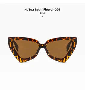 Détail de lunettes de soleil œil de chat écaille de tortue avec verres marron C04