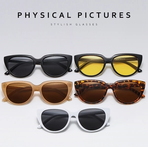 Five assorted cat-eye sunglasses featuring multi-color frames and UV protective lenses