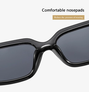 Close-up of comfortable integrated nosepads on stylish black square frame sunglasses