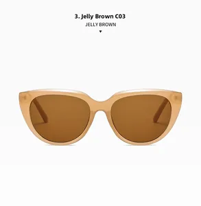 Detailed view of the jelly brown cat-eye sunglasses frame with dark brown lenses