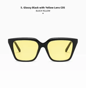 Detail of square frame sunglasses in shiny black with vibrant yellow lenses, model C05