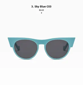Detail of sky blue cat eye sunglasses frame with premium dark grey tinted lenses