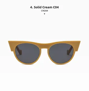 Detailed close-up of cream cat-eye sunglasses frame with dark grey lenses and C04 marking