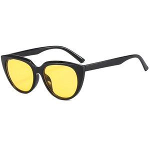 Chic cat eye sunglasses with black round frames and yellow tinted lenses for outdoors