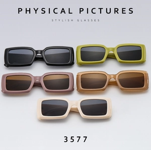 Collection of retro rectangular sunglasses in black, green, pink, amber and beige colors