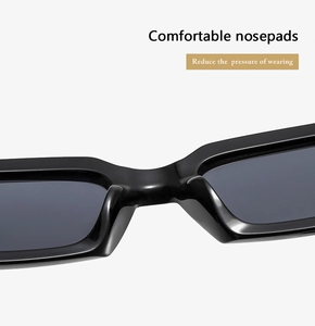 Detail of comfortable integrated nose pads on black rectangular frame sunglasses