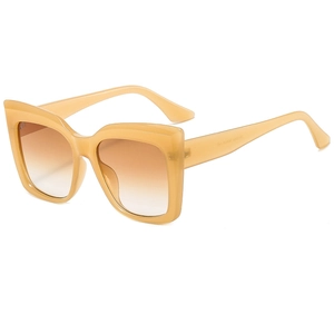 Große bernsteinfarbene Cat-Eye-Sonnenbrille mit braunen Gläsern und Hochglanz-Finish