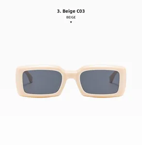 Detailed view of beige rectangular thick frame sunglasses with dark gray lenses