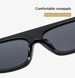 Detail of comfortable integrated nose pads on large square black sunglasses for women