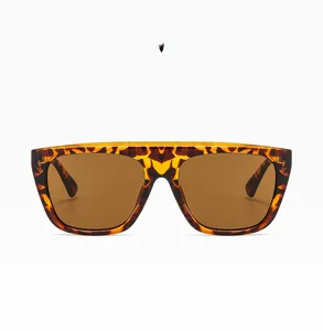 Detail of vintage oversized square sunglasses with tortoiseshell frames and dark brown lenses