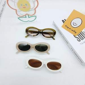 Oval sunglasses set in green, beige, and white colors with a trendy hip-hop style