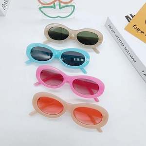 Retro oval sunglasses set in four colors featuring Y2K hip-hop style on white background