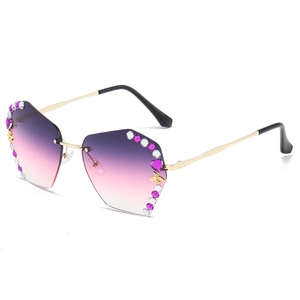 Frameless rimless sunglasses with gradient pentagon lenses and diamond bee accent