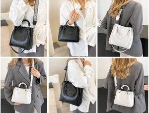 Vistas detalladas de bolso tote grabado con correas intercambiables étnica y fina de cuero