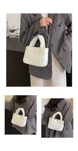 Detailed views of white quilted PU leather bucket bag with silver chain strap and puffy design