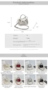 Size chart showing mini PU crossbody bag dimensions with heart charm details