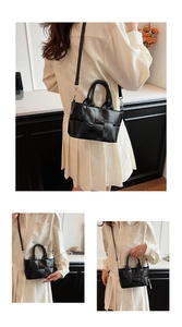 Detail of glossy black woven leather texture and detachable strap on mini handbag