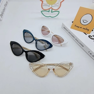 Fashionable cat eye sunglasses with gold chain temples in multiple frame colors