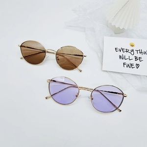 Lunettes de soleil rondes pour enfants avec monture dorée et verres pastel
