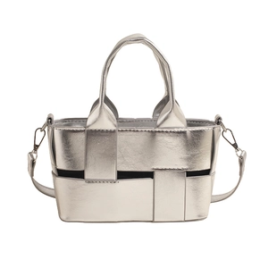 Minimalist silver woven handbag with metallic finish and detachable shoulder strap
