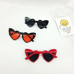Fashionable heart-shaped kids sunglasses in black and red colors with smooth resin frames