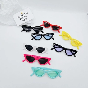 Detailed multi-color display of children's cat-eye sunglasses with UV protection lenses