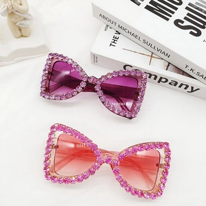 Fashion oversized butterfly bow sunglasses with rhinestones in purple and pink