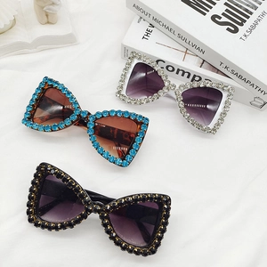 Three pairs of fashionable butterfly cat-eye sunglasses with sparkling rhinestones decoration