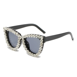 Women's cat eye sunglasses with black frame and sparkly crystal rhinestone embellishments