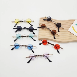 Collection of mini colorful retro round sunglasses with metal frames for dolls or pets