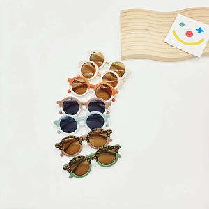 Set of seven round frame kids sunglasses in assorted colors with matte finish and leopard print