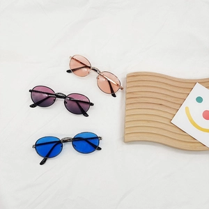 Classic round metal frame kids sunglasses with colorful lenses and rhinestone bridge details