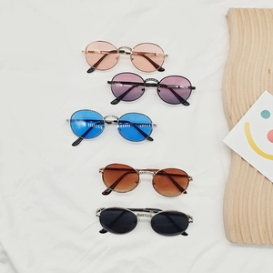 Five pairs of kids' vintage round metal sunglasses with glitter rhinestone bridge