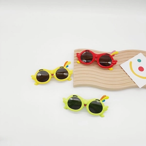 Cute parrot cartoon children's sunglasses with UV protection in yellow, red and green