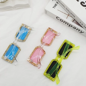 Retro rectangle sunglasses set with crystal rhinestones in blue, pink, and green