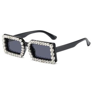 Retro square black sunglasses for women with sparkling rhinestone frames on white background