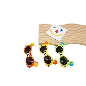 Lunettes de soleil cartoon mignonnes pour enfants avec verres ronds en vert, jaune et orange
