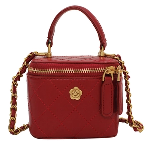 Mini red quilted leather box bag with gold floral logo and woven chain strap