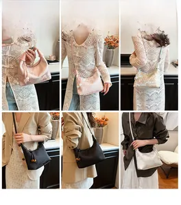 Detail view of New Chinese style hobo bags with floral embroidery and tassel charm