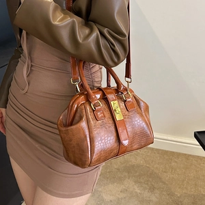 Elegante Damen Handtasche mit Kroko-Muster, Vintage Umhängetasche mit Top-Handle und Bügel.