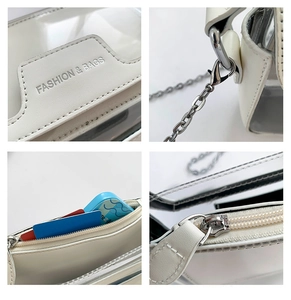 Detailansicht der weißen Jelly-Tasche mit Metallkette, Reißverschluss und Logo