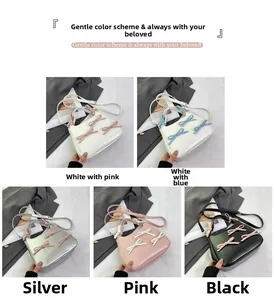 Detail view of mini crossbody bags showing five colors with bow decor and PU leather texture