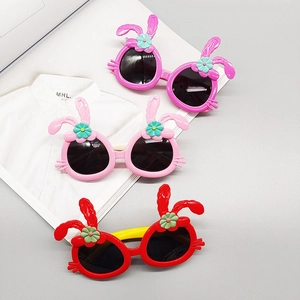 Children's polarized bunny ear sunglasses in red and pink with floral accents
