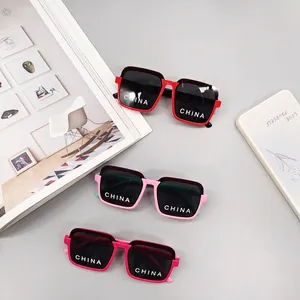 Kids trendy square frame sunglasses in red and pink colors with UV protection lenses
