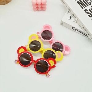 Kids polarized cat-ear sunglasses in pink, yellow, and red with UV protection frames