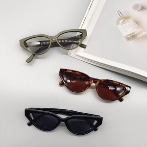 Fashionable triangle cat-eye sunglasses in olive green, tortoise, and black colors