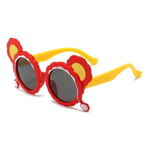Kids polarized cat-ear sunglasses with red floral frame and UV protection lens