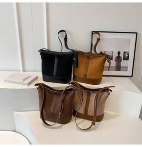 Detailed comparison of four matte suede bucket bags in black, brown, tan, and beige colors